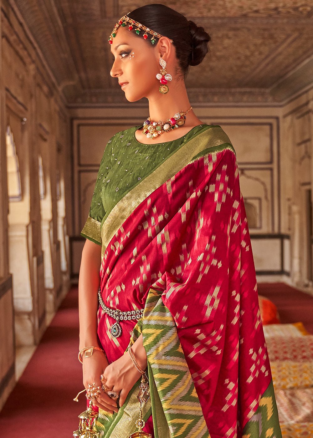 Patola green and red dola silk saree with elegant zari border - Image 3