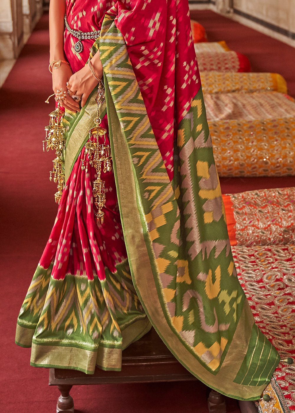Patola green and red dola silk saree with elegant zari border - Image 4
