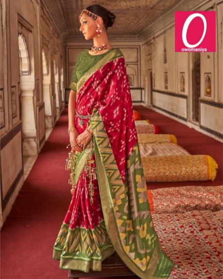 Patola green and red dola silk saree with elegant zari border