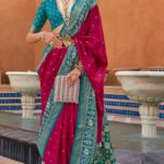 Patola Silk Saree in Rani Pink Zari Weaving with Teal Green Border & Unstitched Blouse