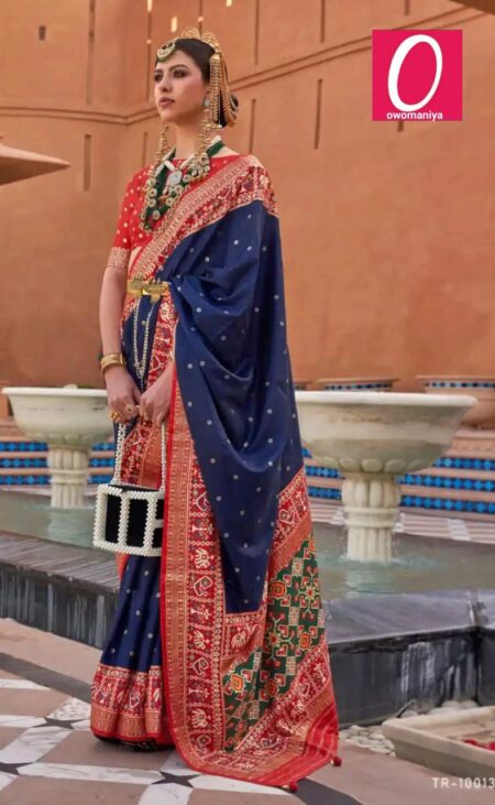 Patola Silk Blend Saree in Navy Blue & Red with Ethnic Motifs Woven Design