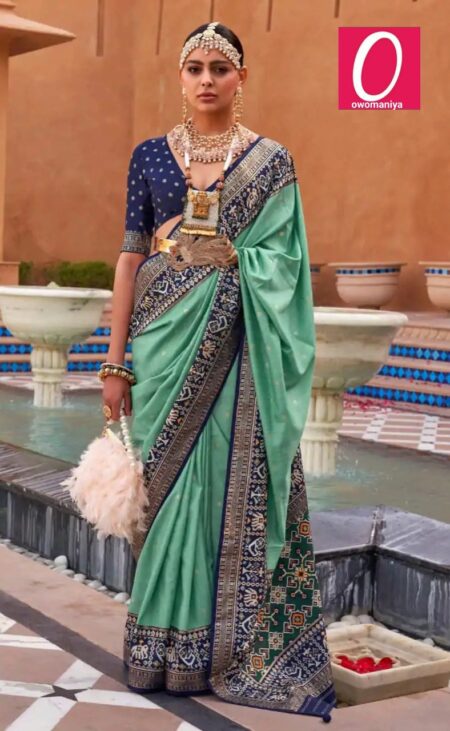 Patola Silk Saree in Turquoise Zari Weaving with Blue Border & Unstitched Blouse