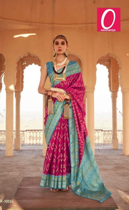 Patola graceful rani pink silk saree featuring teal blue printed blouse